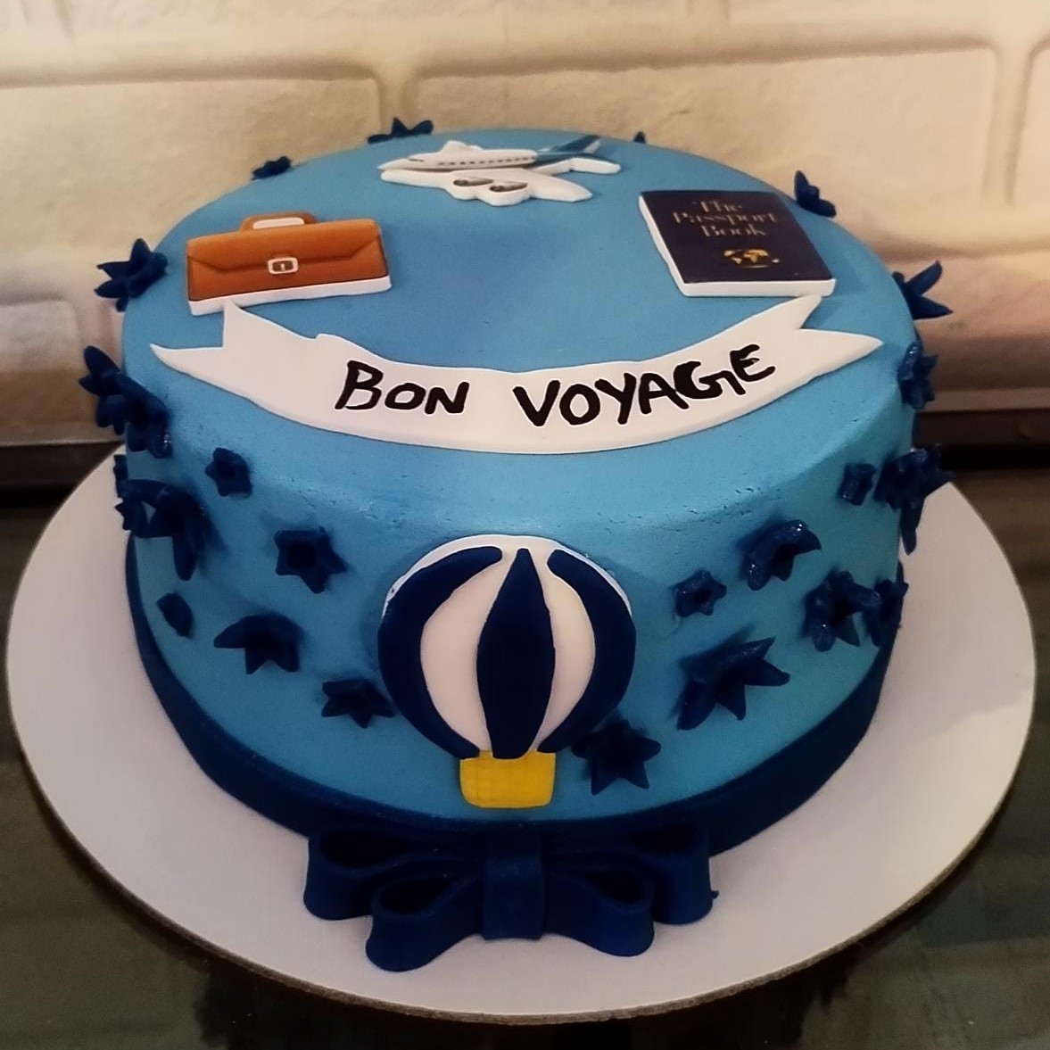 bon voyage theme cake